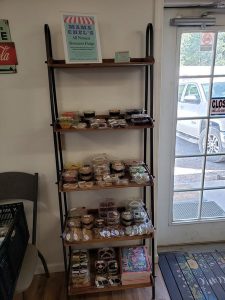 Packages of fudge on a shelf